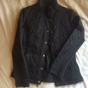 Black quilted and knit jacket